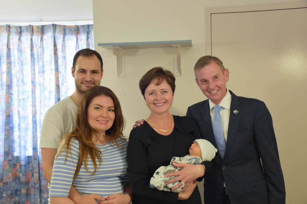 Andriy (Dad), Maryna (Mum), baby Leo, Minister Davies, Bruce Notley-Smith