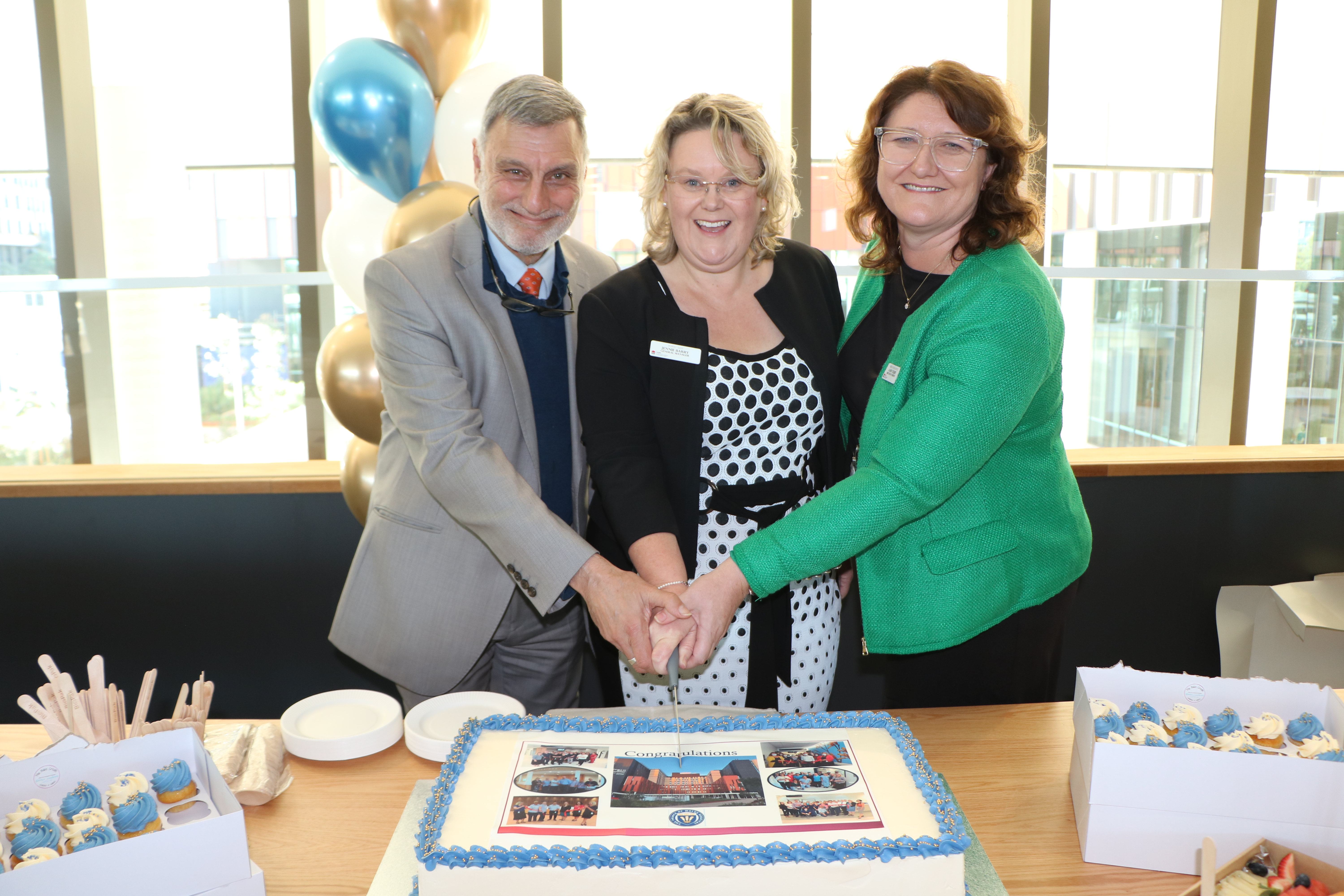 Prince of Wales Hospital Executive team cut the cake in celebration