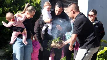 Smoking ceremony with mums and babies
