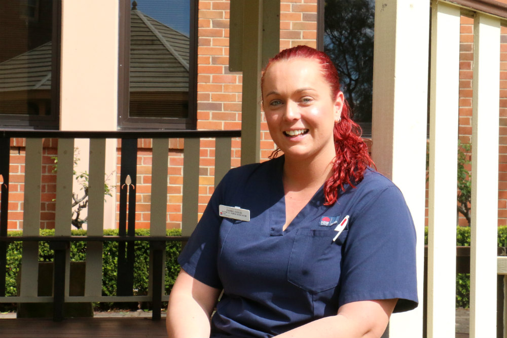 Nurse in uniform in outdoor setting