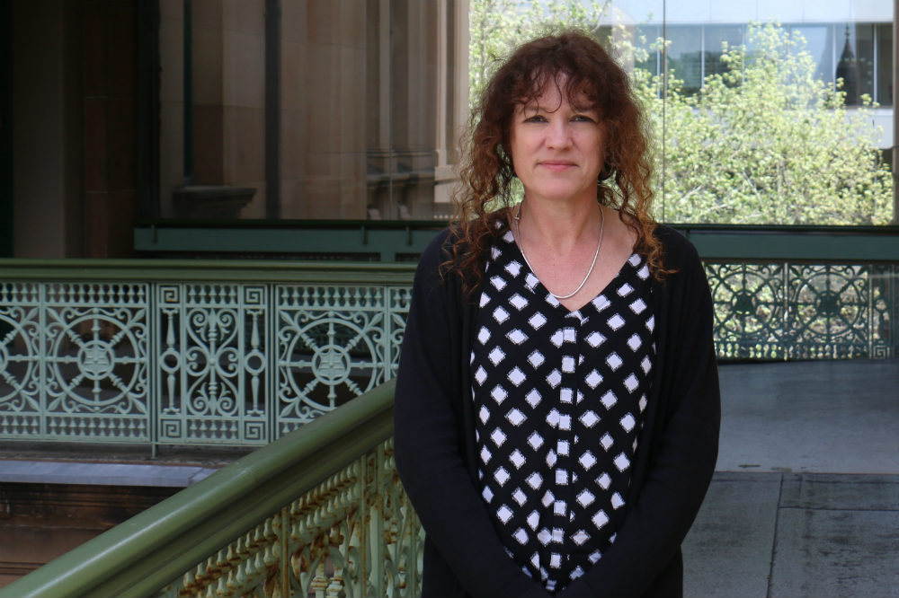 Woman standing on balcony