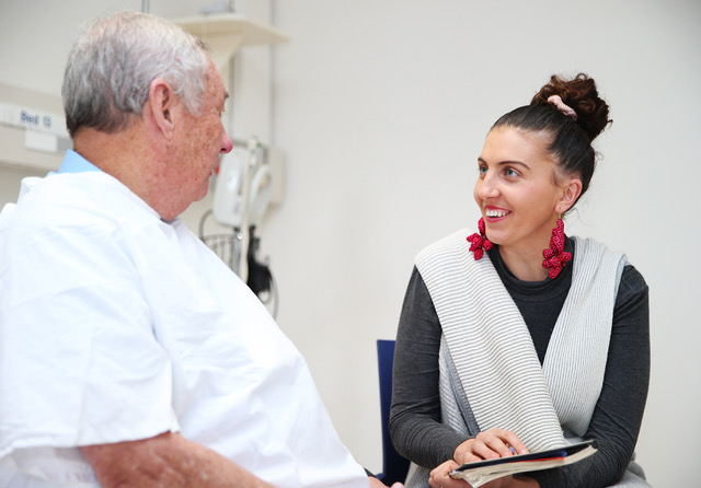 Social worker with patient