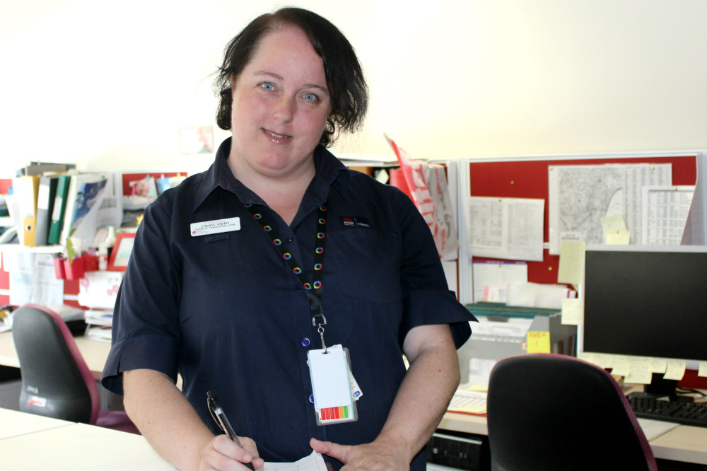 Woman standing in office setting