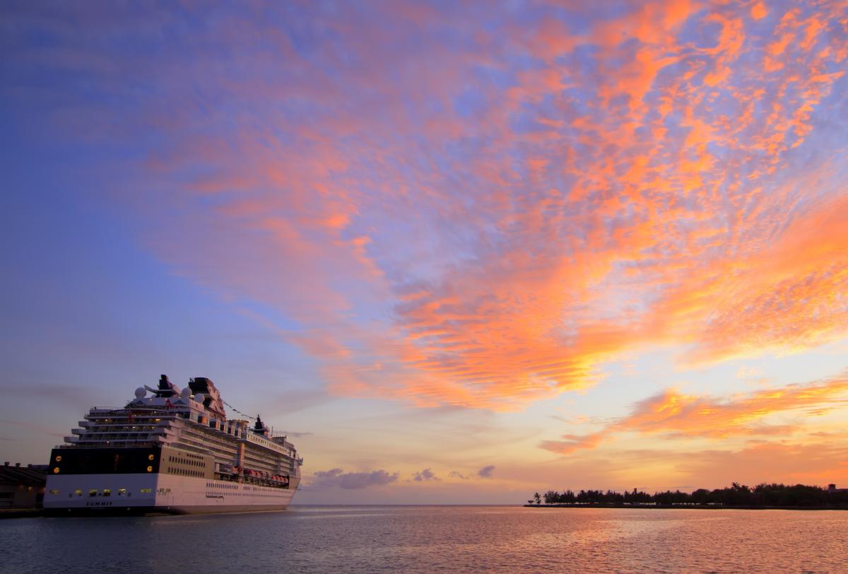 Cruise ship in sunset. The Sydney Cruise Ship Health Surveillance Program works to improve health surveillance on cruise ships and respond to outbreaks of infectious disease.