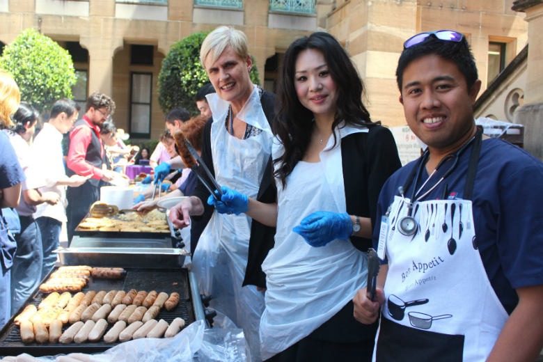 Hospital staff serving bbq lunch