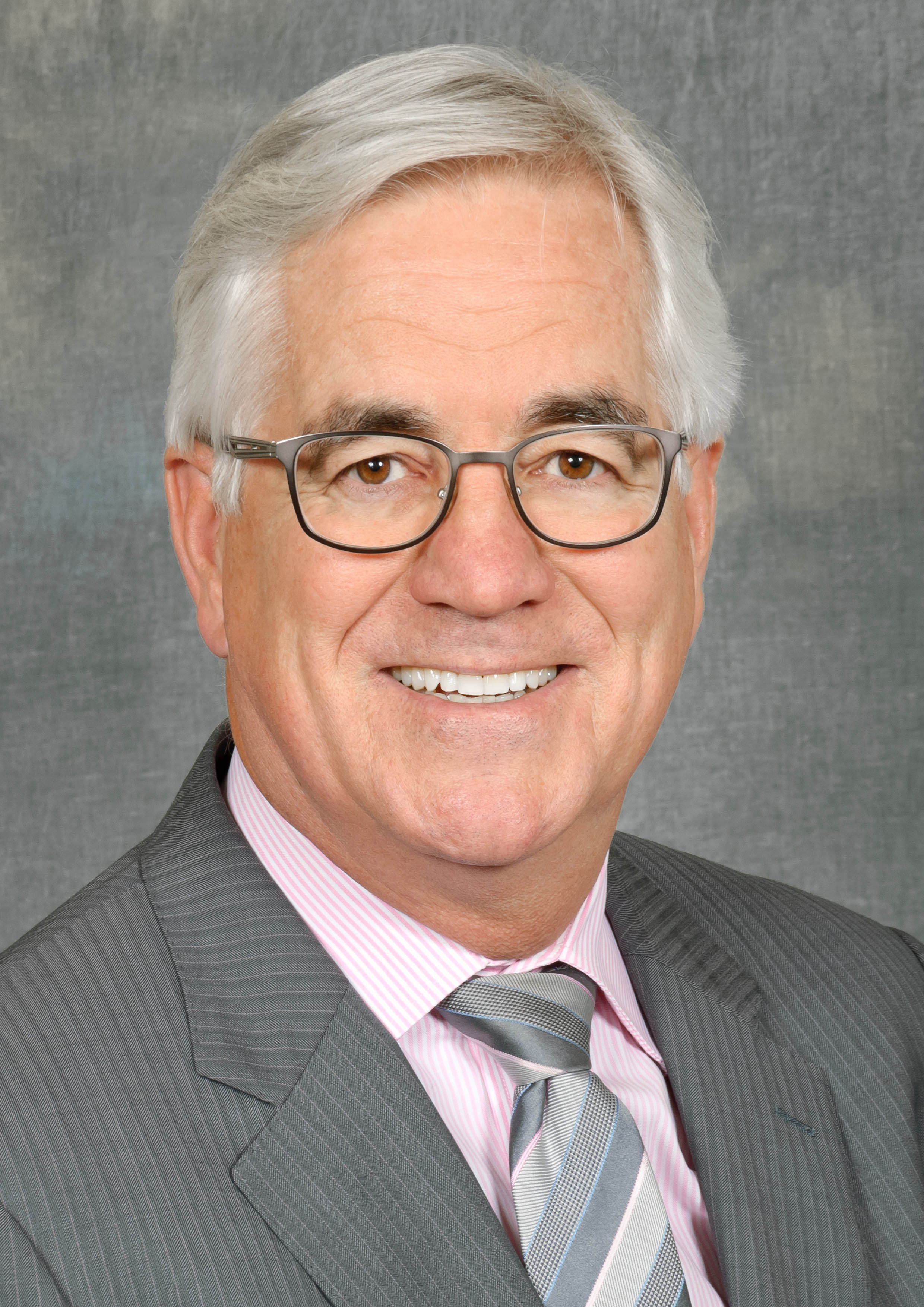 Portrait photo of Dr Greg Stewart