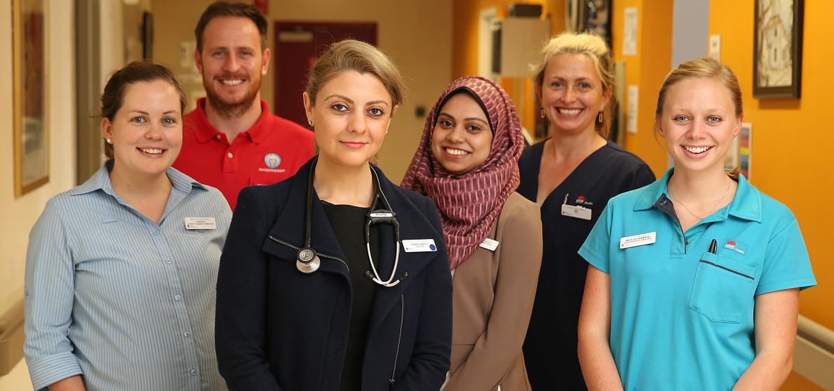 Group of healthcare staff in corridor