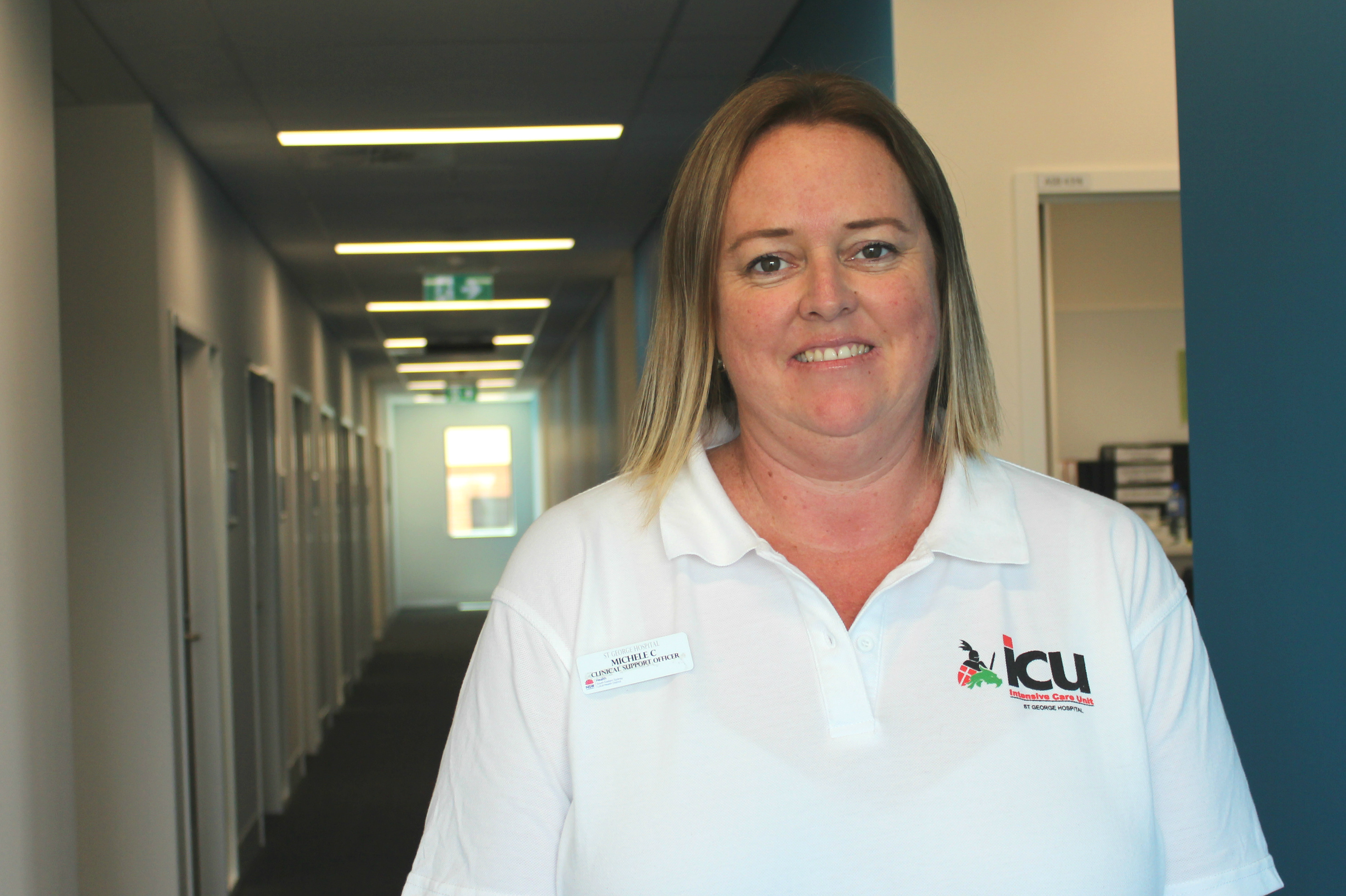 Lady in white t-shirt in hallway