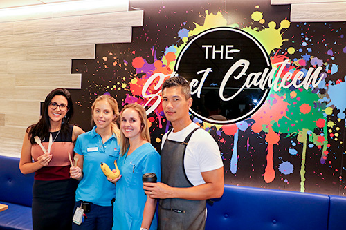 Cafe and hospital staff outside cafe