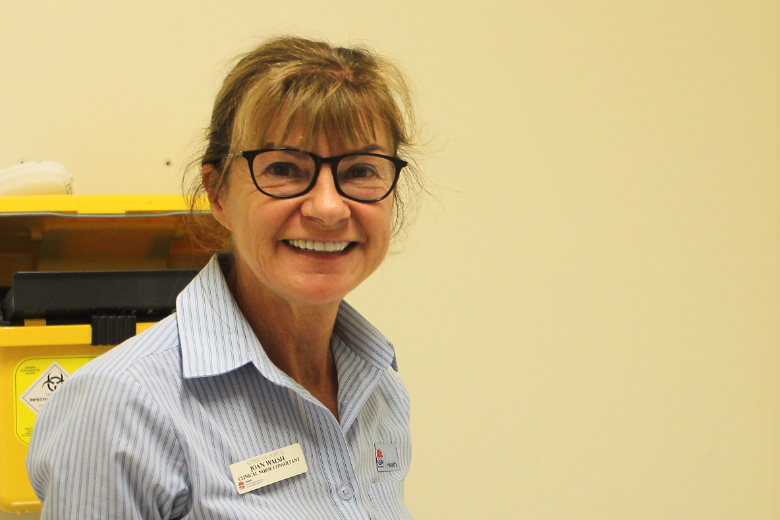 Smiling woman in consulting room