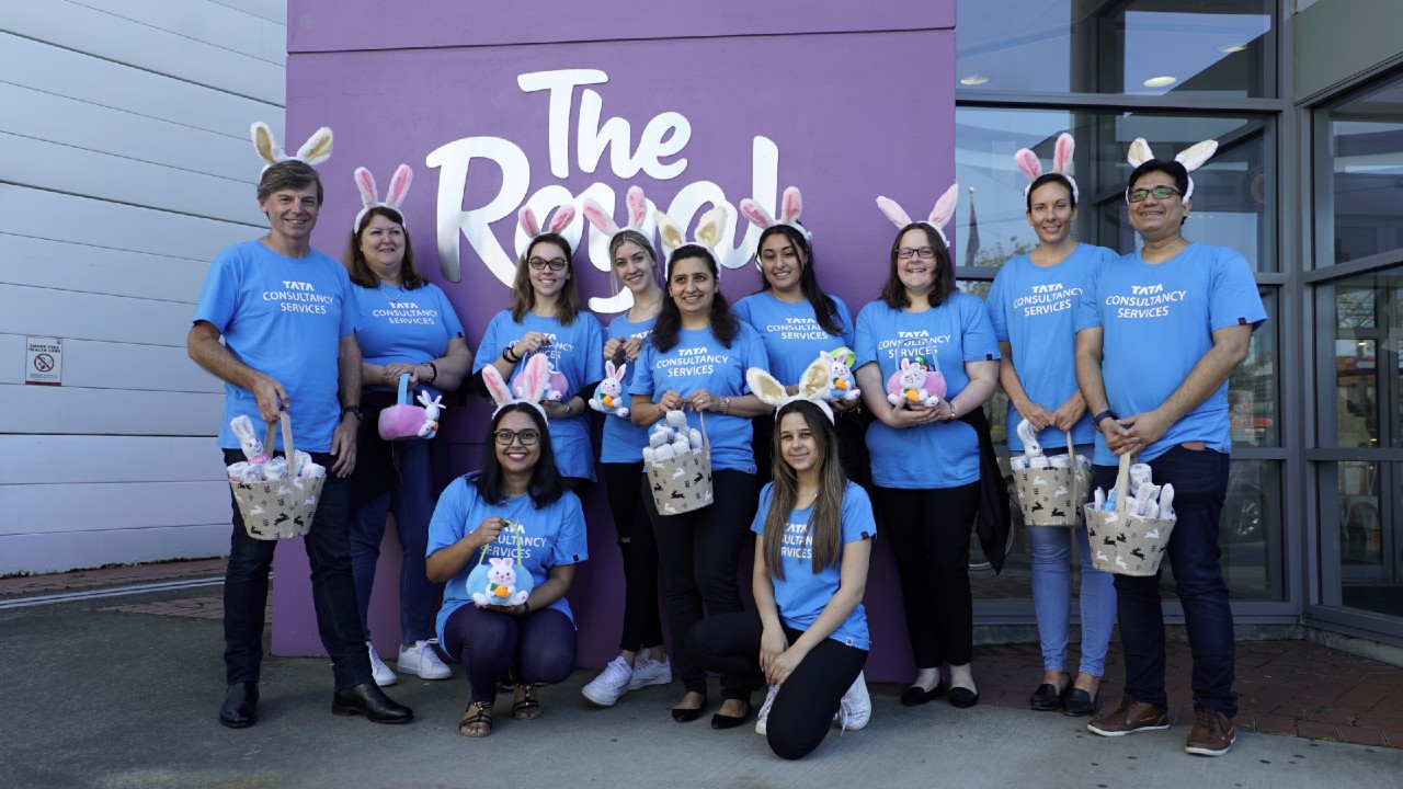 Volunteers out the front of The Royal with Easter eggs 
