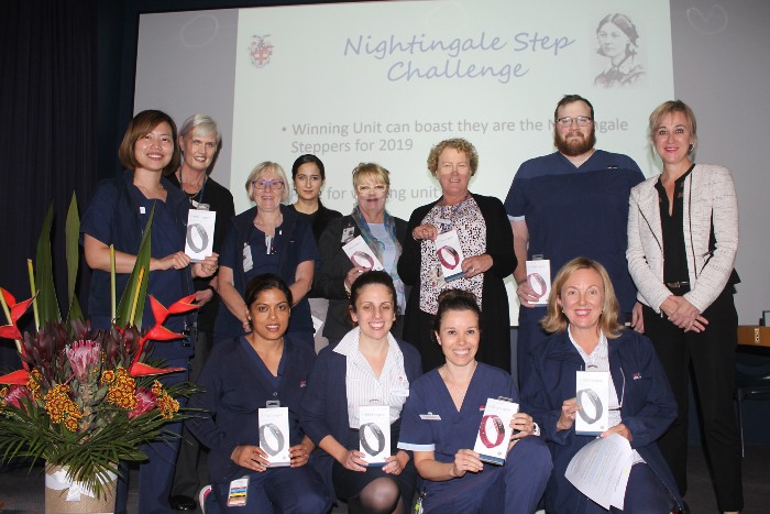Sydney/Sydney Eye staff holding Fitbits