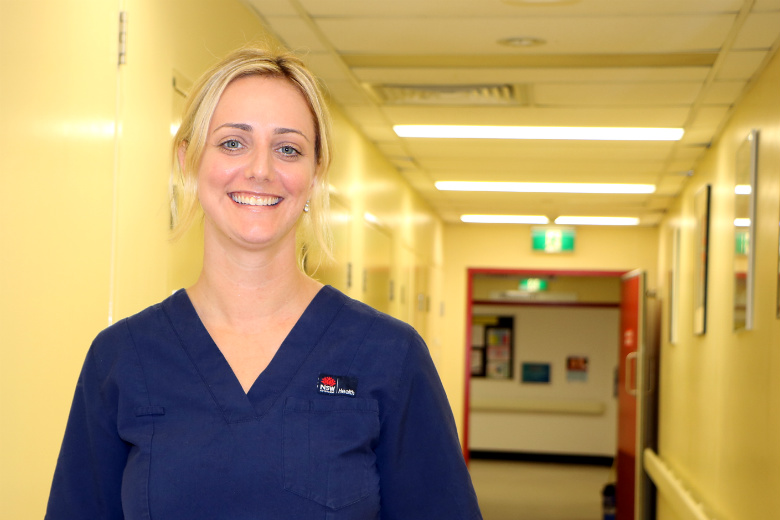 Nurse in hospital corridor