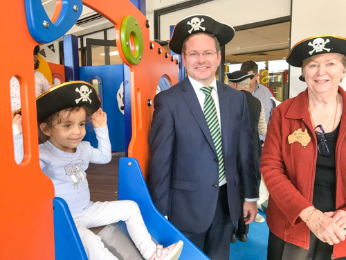 Mark Coure MP, Jan Gartrell (Hurstville Rotary Club member) & little Juliet testing out the new play area 