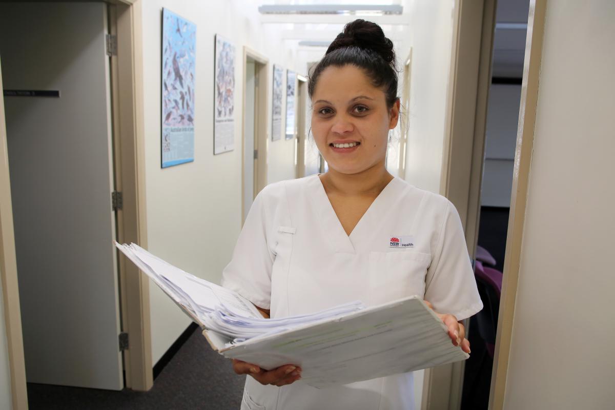 Nurse with patient file