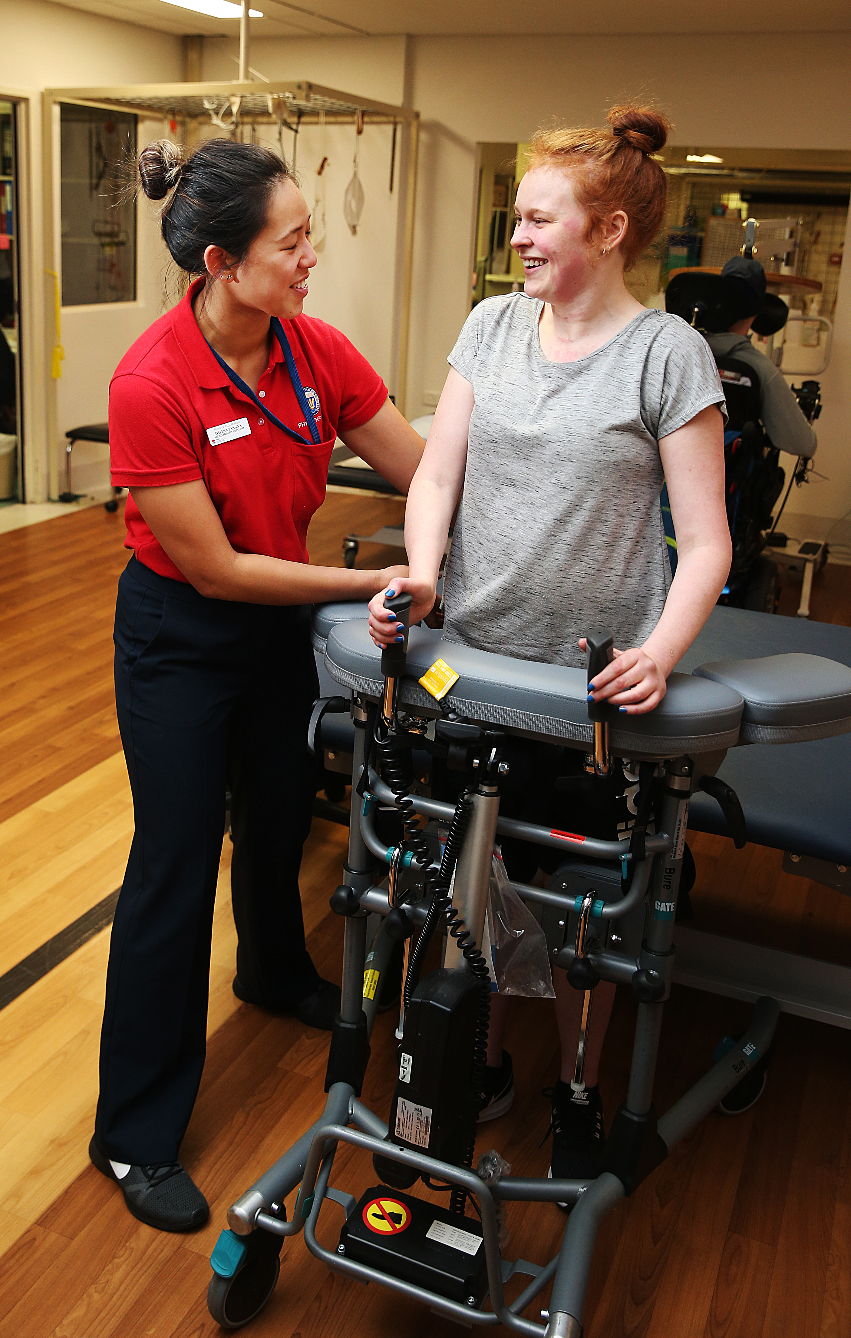 Physiotherapist helping a patient mobilise
