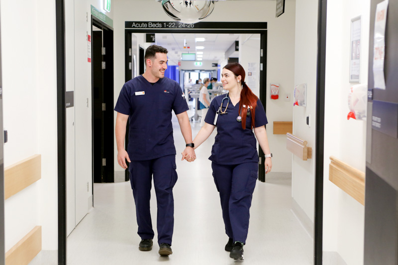 Jak and Chloe walking through the wards 