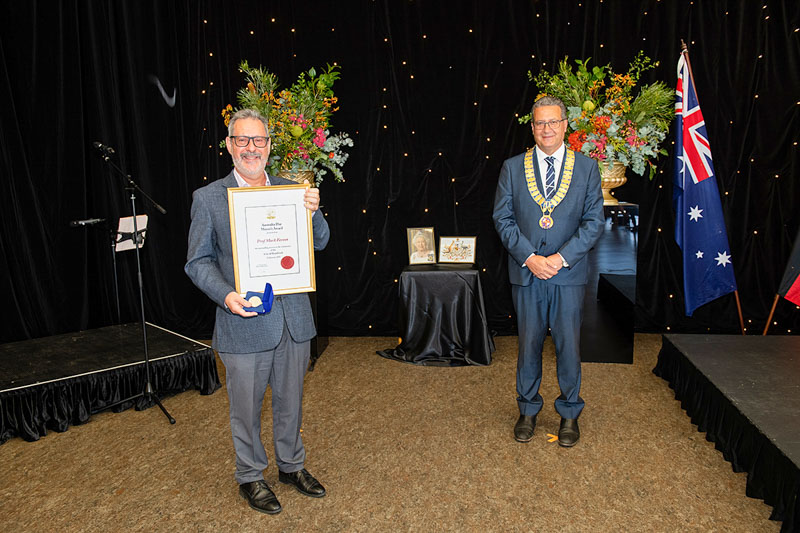 Randwick Mayor and Professor Mark Ferson holding his award 