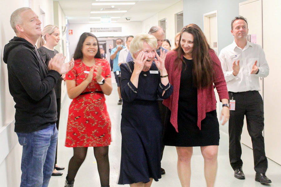 Kay surprised by her colleauges at her farewell party 