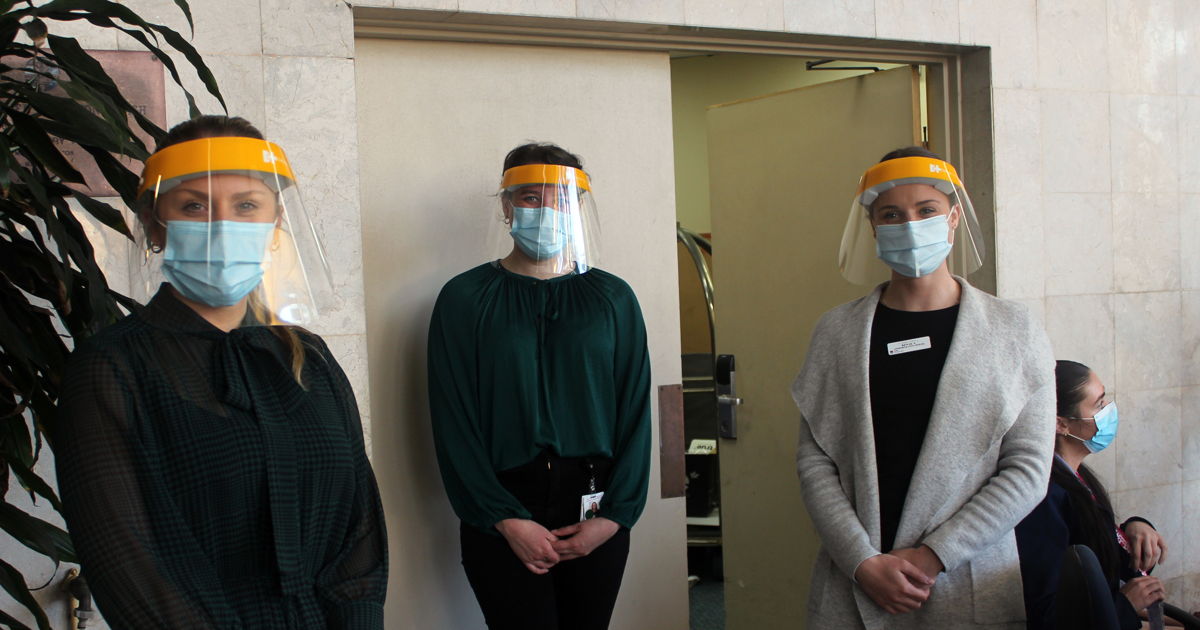 Staff wearing masks 