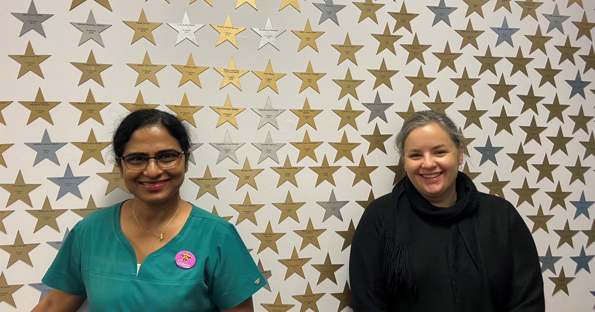 Sheeba Binoy and Michelle Currie standing outside the Neonatal Intensive Care Unit