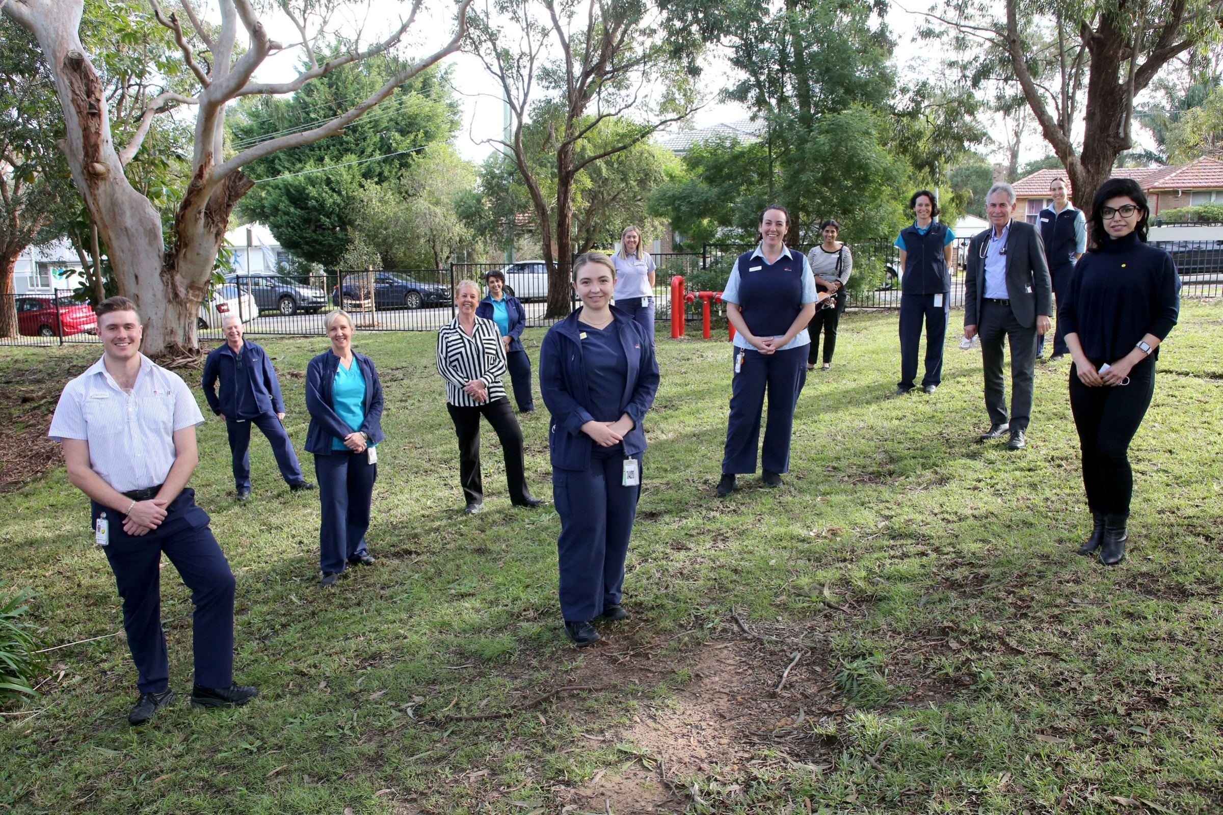 Sutherland Hospital staff standing together in a group shot outside