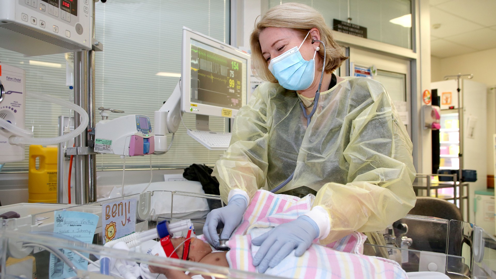 Doctor and baby in the Neonatal Intensive Care Unit