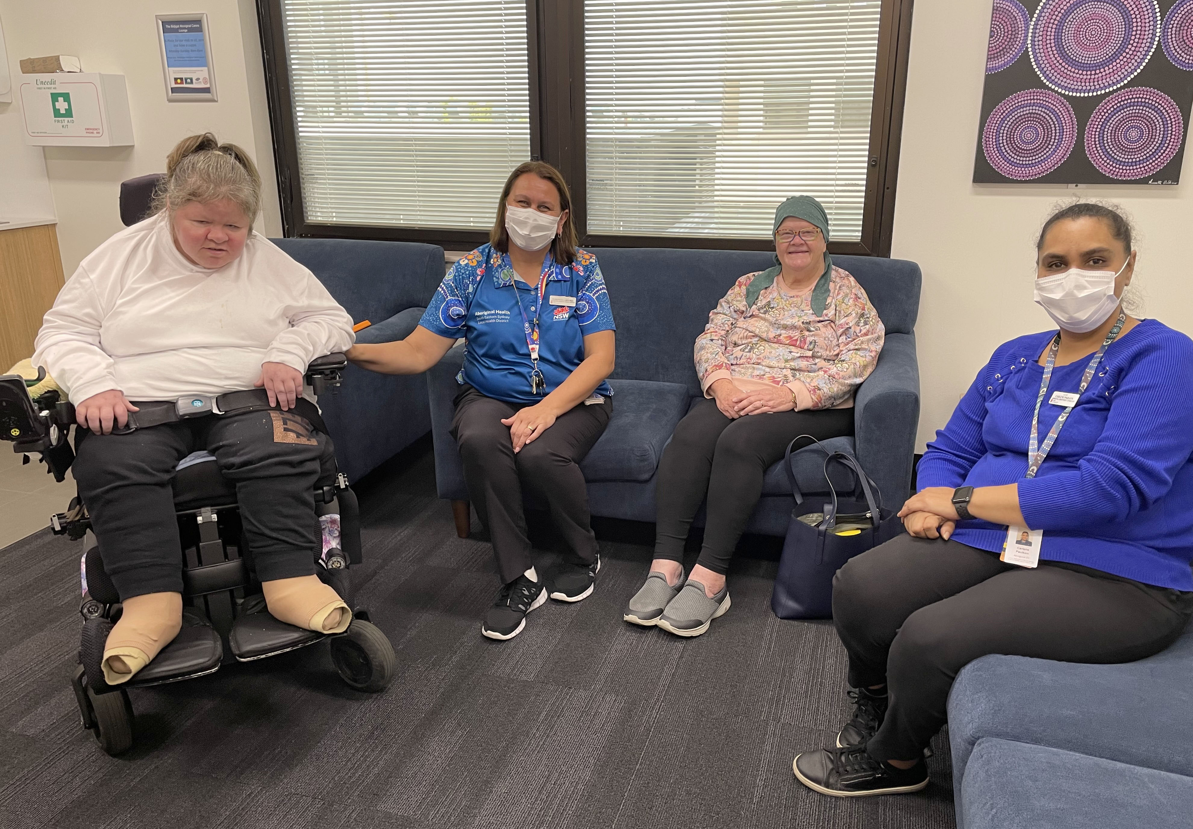 Four people sitting in the Aboriginal Carers Lounge at St George Hospital