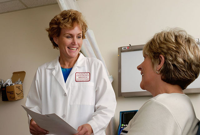 Doctor talking to patient