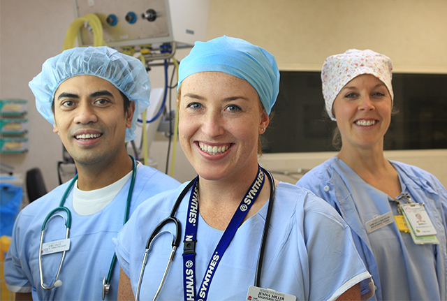 Group of three smiling healthcare workers