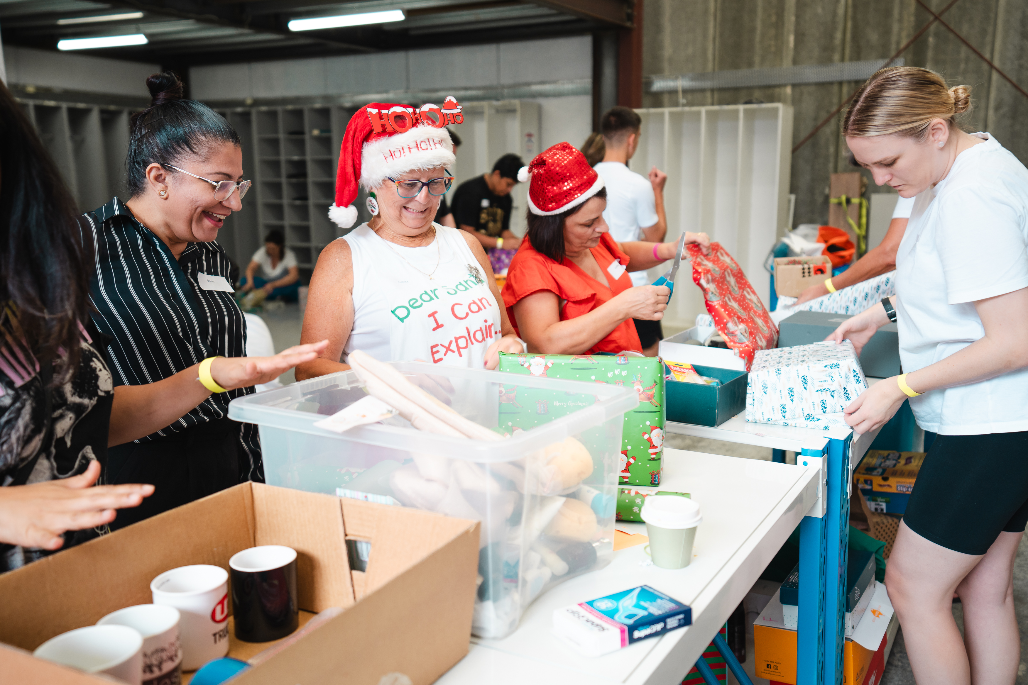 Volunteers packing boxes for the Christmas donation drive