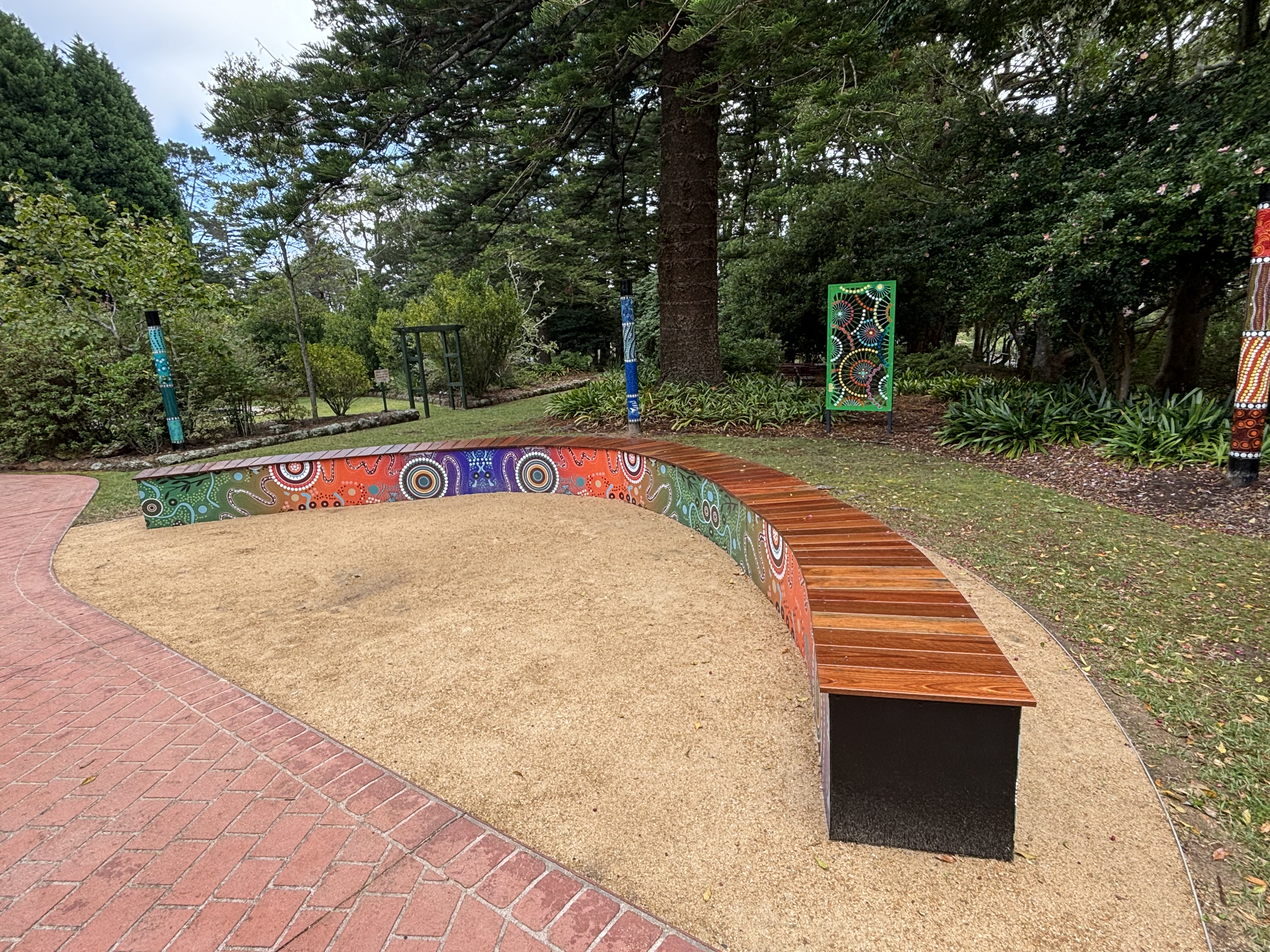 Image of Yarning Circle spotted gum boomerang seat