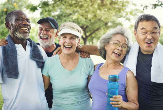 A group of older adults after an exercise outdoors session