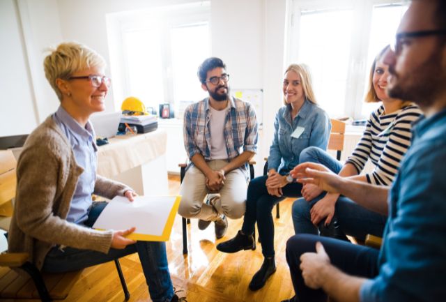 A group of people meeting about a project