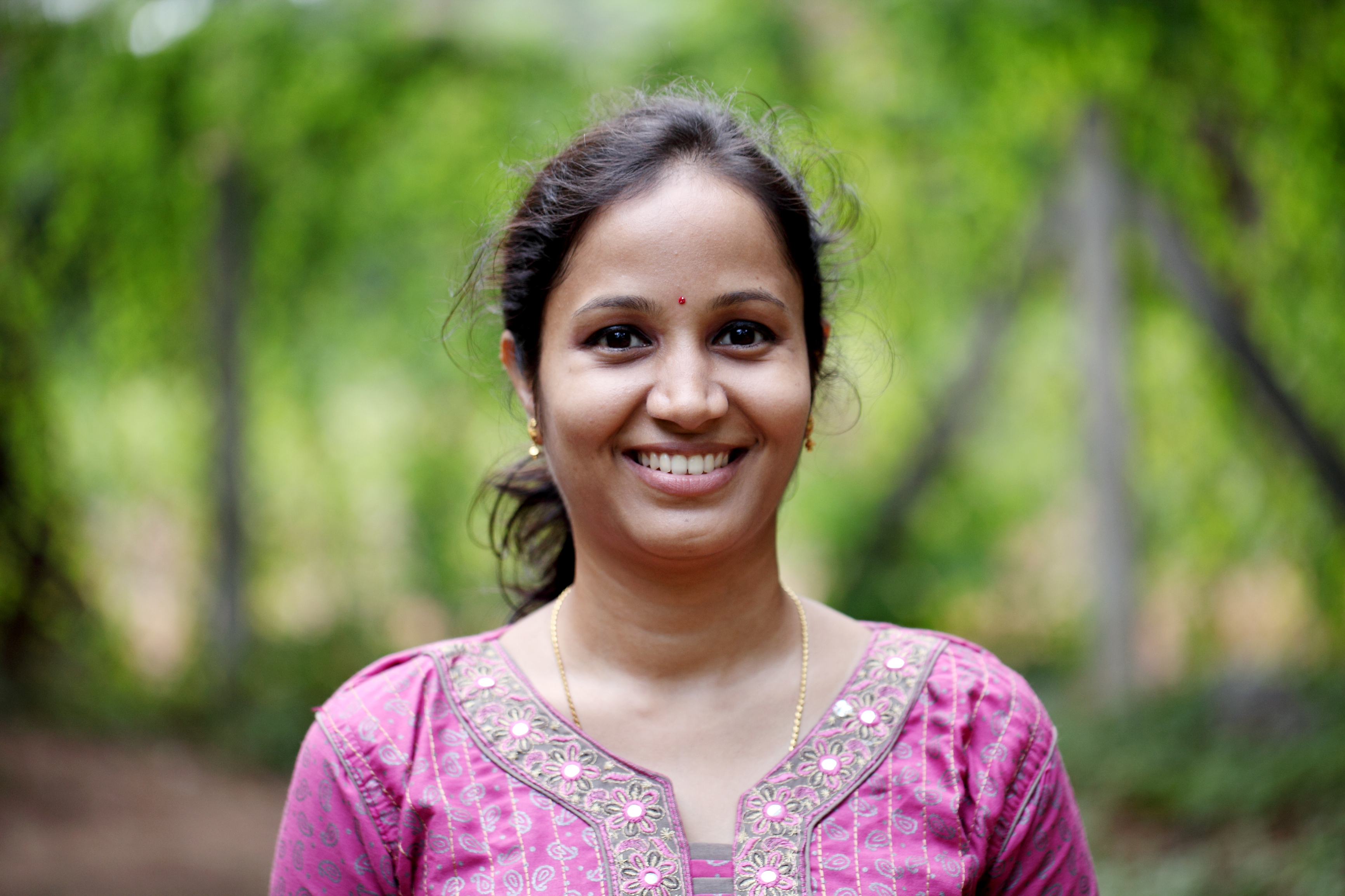 South East Asian woman smiling
