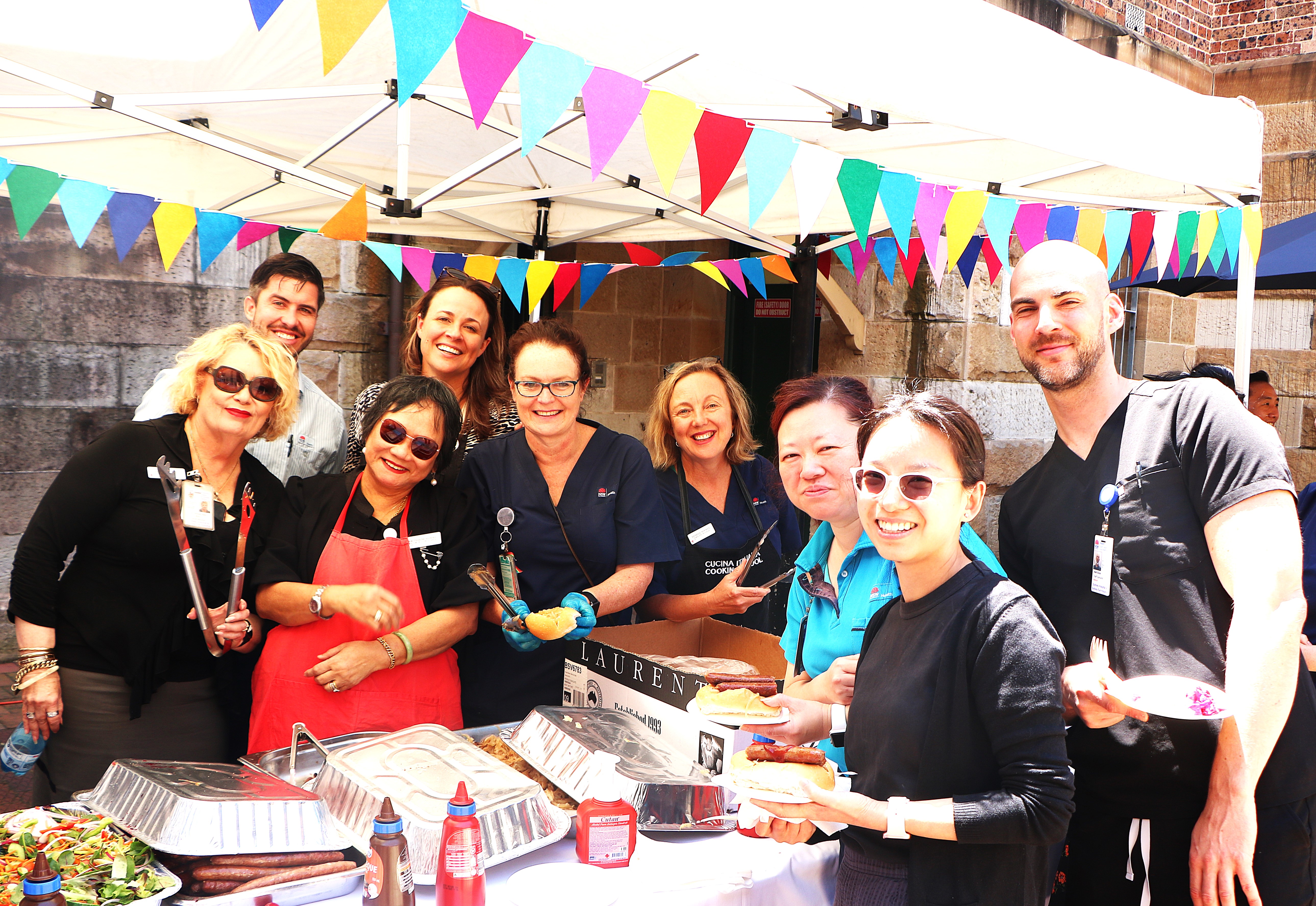 Staff enjoying a BBQ lunch on Foundation Day 