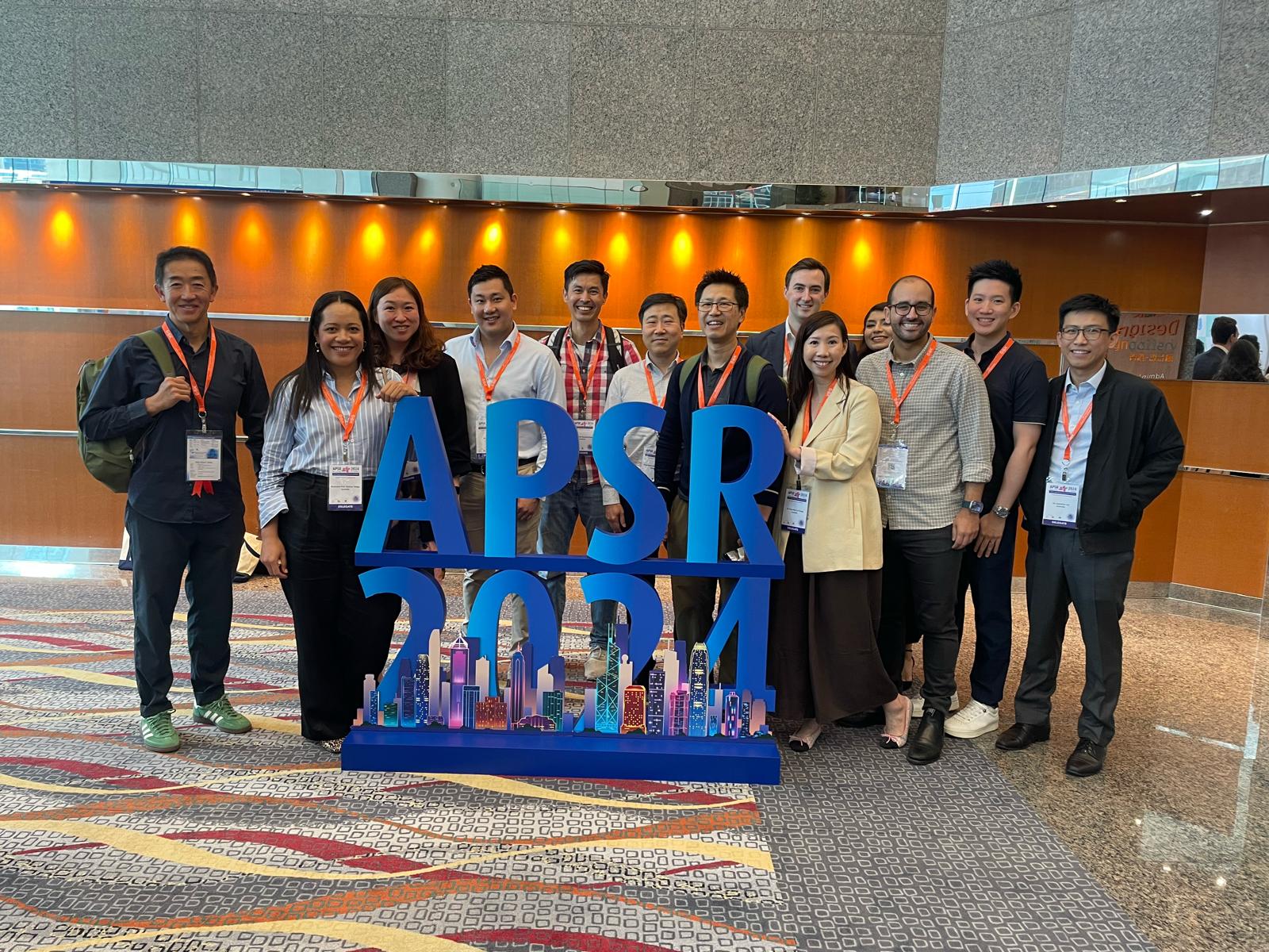 The group picture includes a selection of Sydney attendees including our department team members