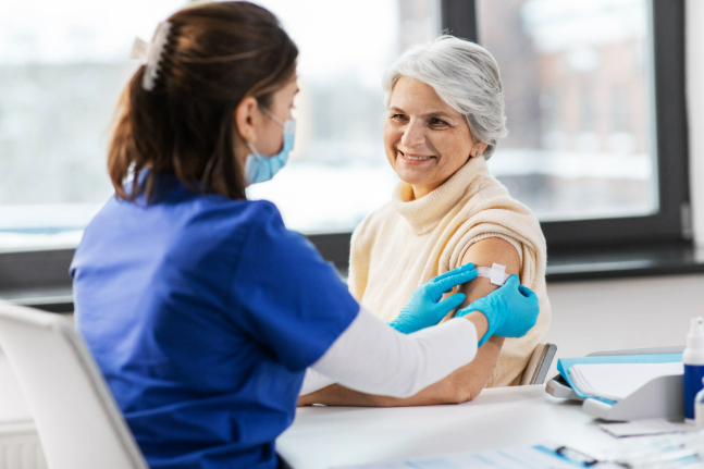 women receiving a vaccine