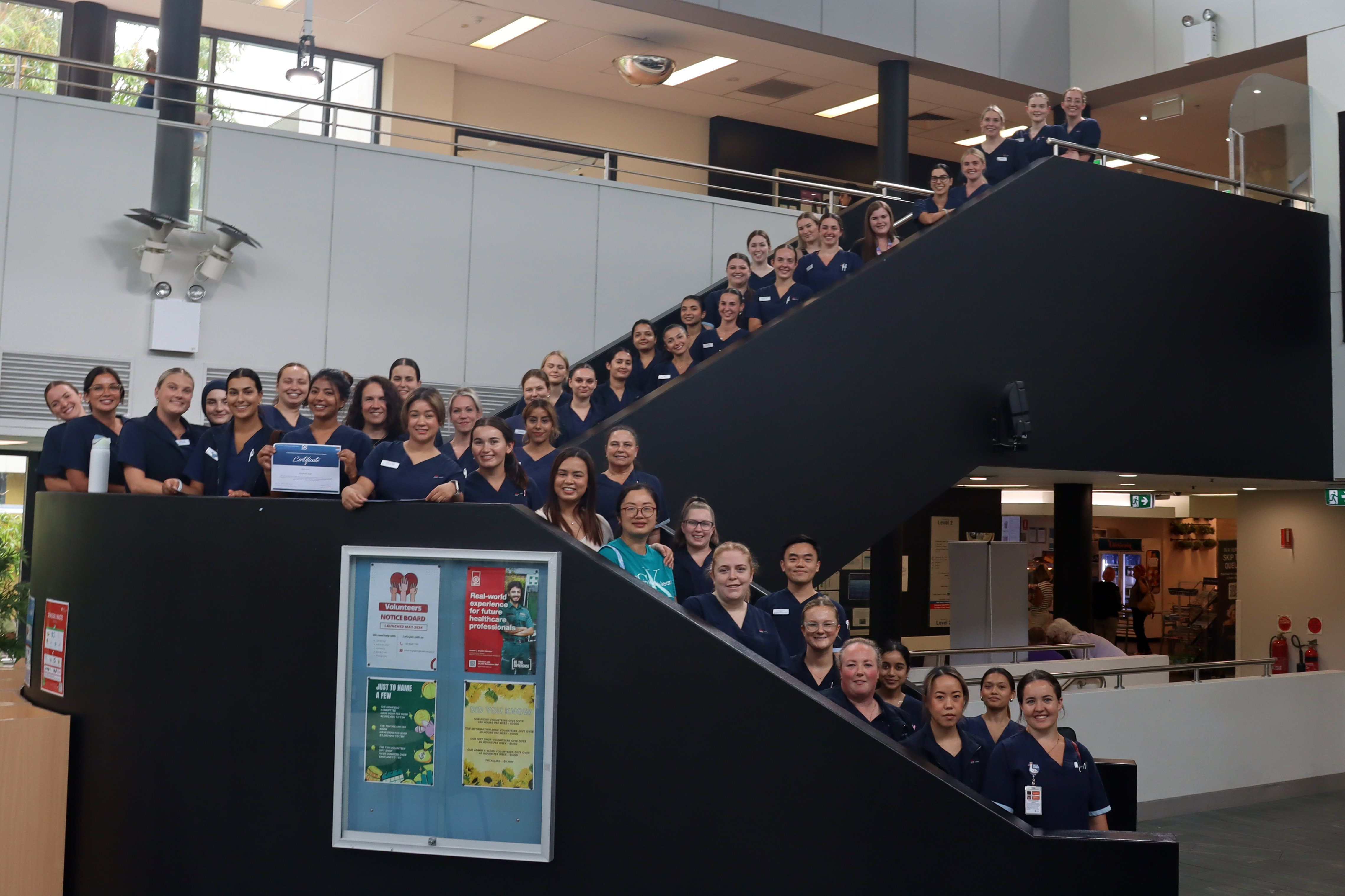 Large group of nurses with Graduation Certificates