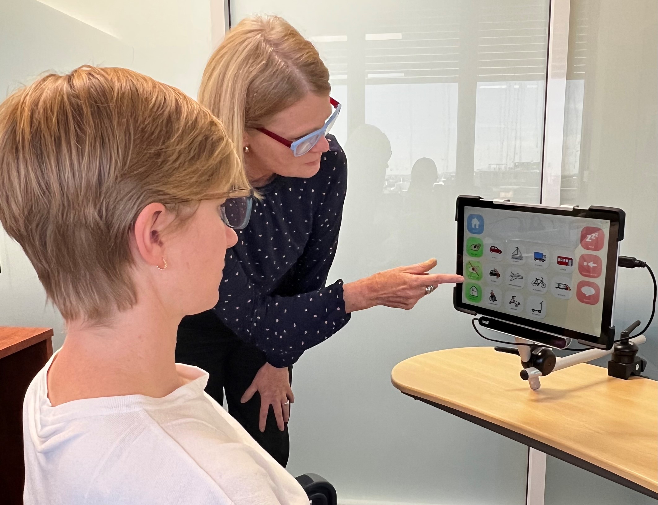 Clinician, Val Maynes showing patient CAT interface