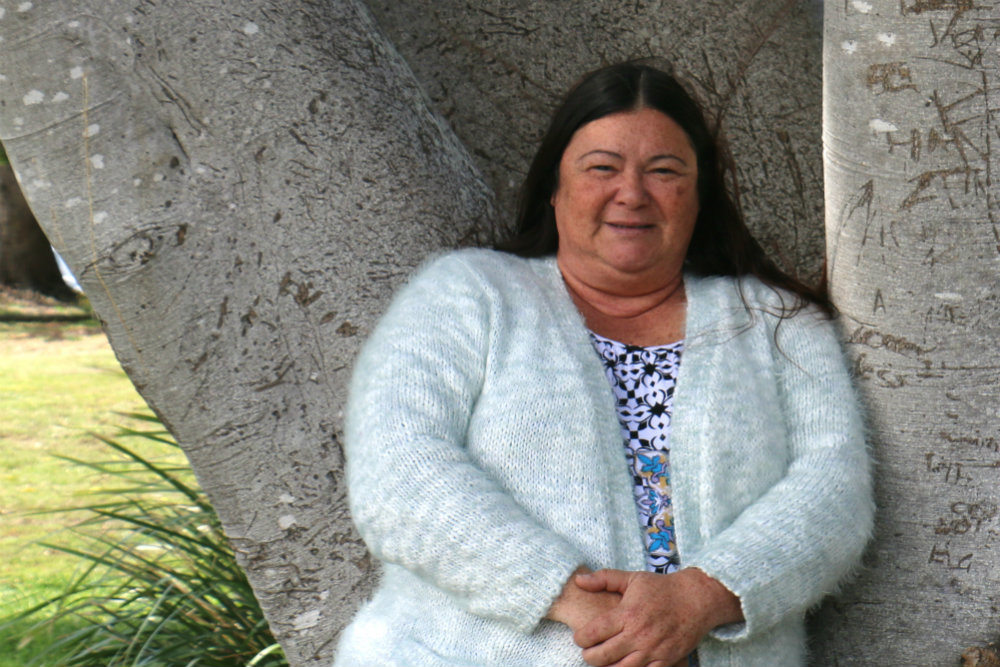 Margaret Broadbent standing in front of a tree