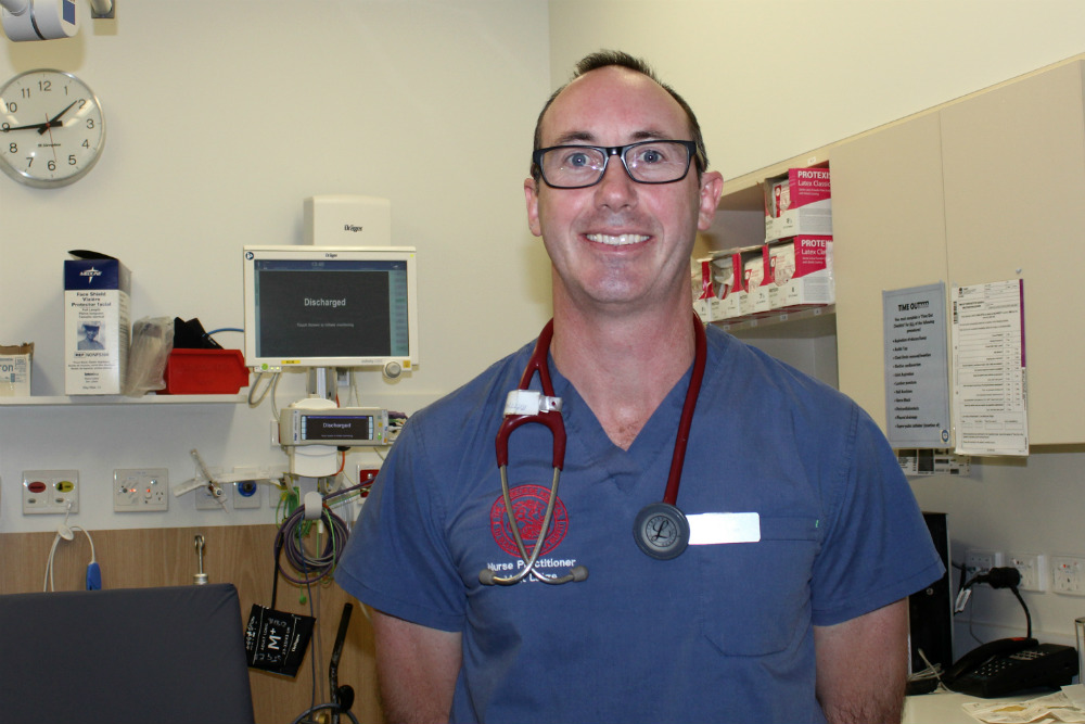 Matt Lutze in uniform in clinical setting 