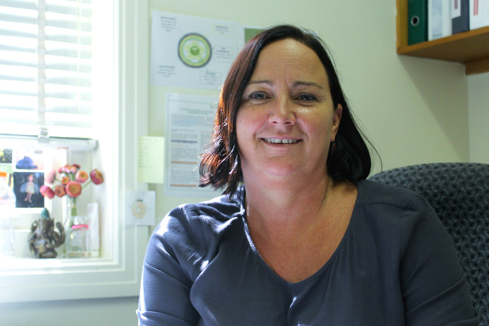 Suzanne Garcia in office setting 