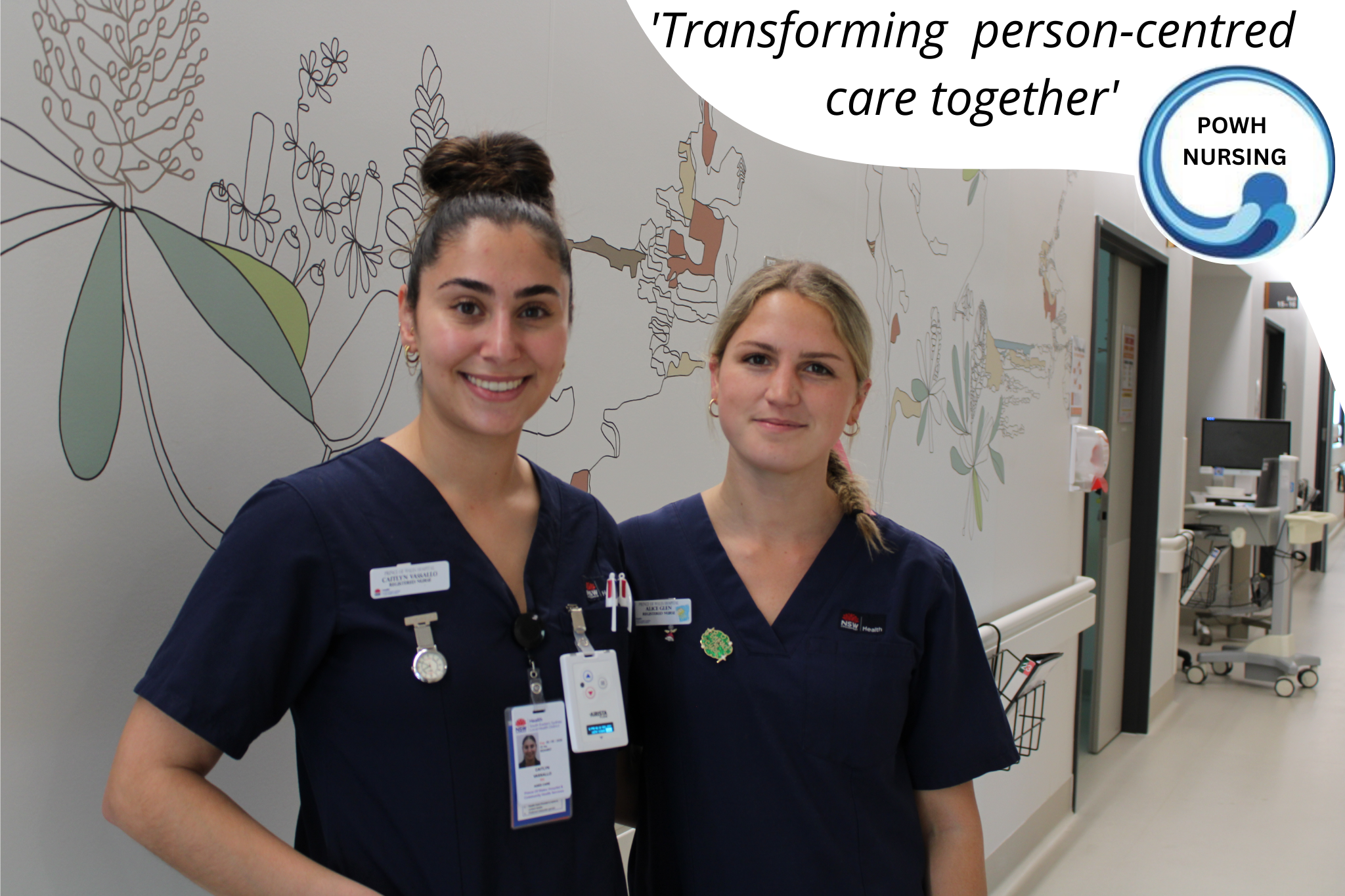 Two nurses in ward corridor