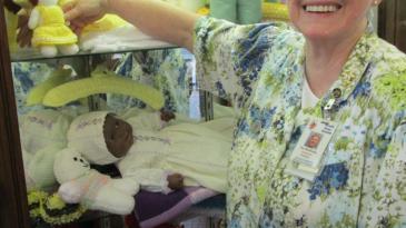 A volunteer - Fay Skuthorpe - in the Little Shop