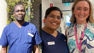 Three nurses smiling