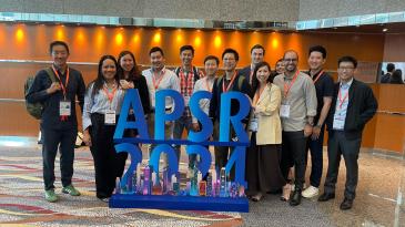 The group picture includes a selection of Sydney attendees including our department team members