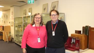 Librarian Maria Sablatura-Nagy and Library Director John Holgate