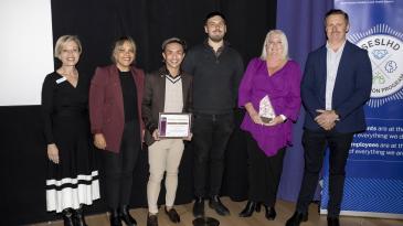 Photo of Aboriginal Healthcare team with award